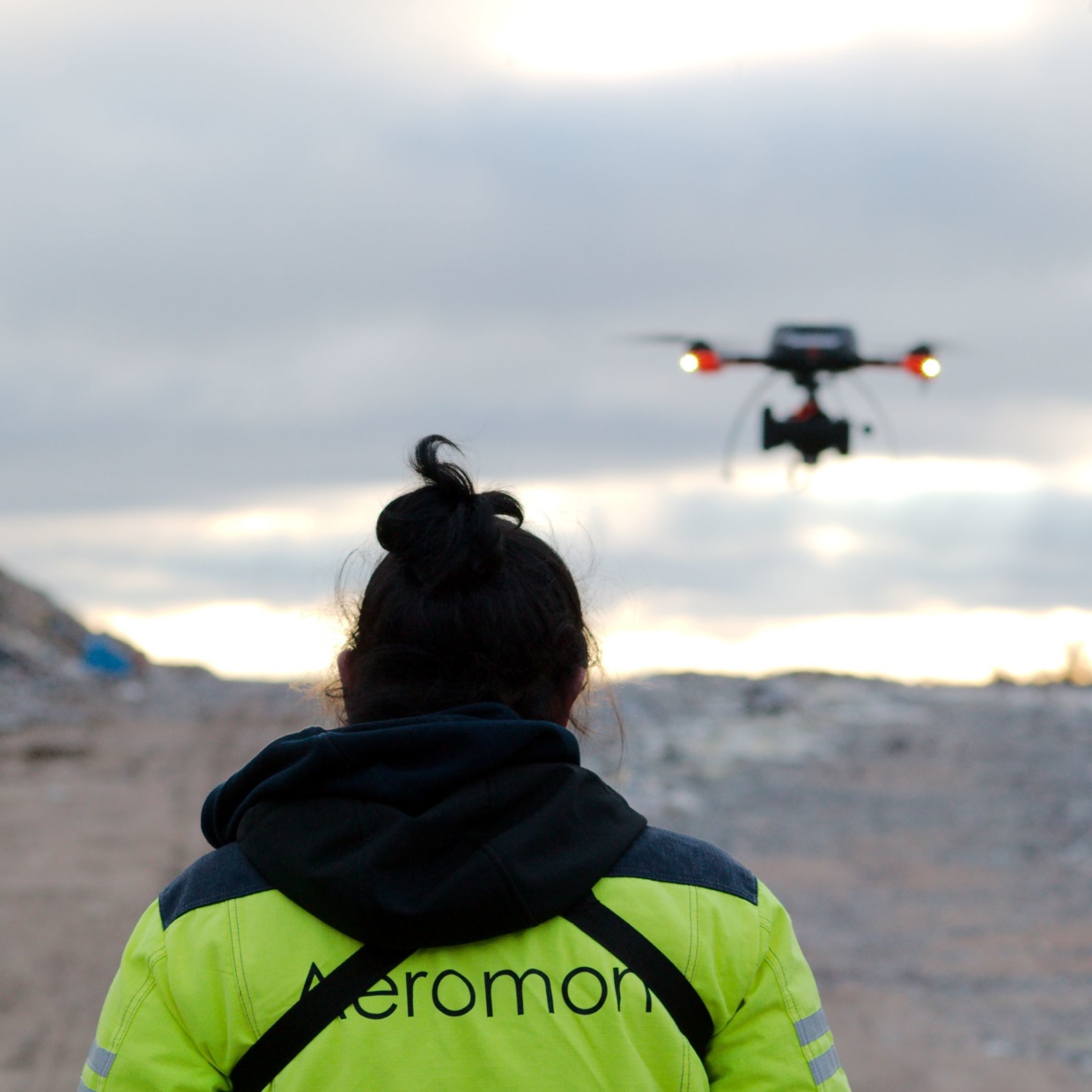 Aeromon field engineer flying a drone.